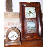 A 19th century American mahogany cased wall clock, 26" high, and an oak cased mantel clock with