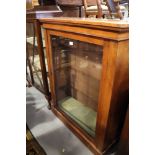 A late 19th century walnut pier cabinet enclosed glazed door, on block base, 33" wide x 43" high