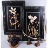 Two ivory pictures of flowers, in ebony frames, two horn models of birds and a mounted elephant's