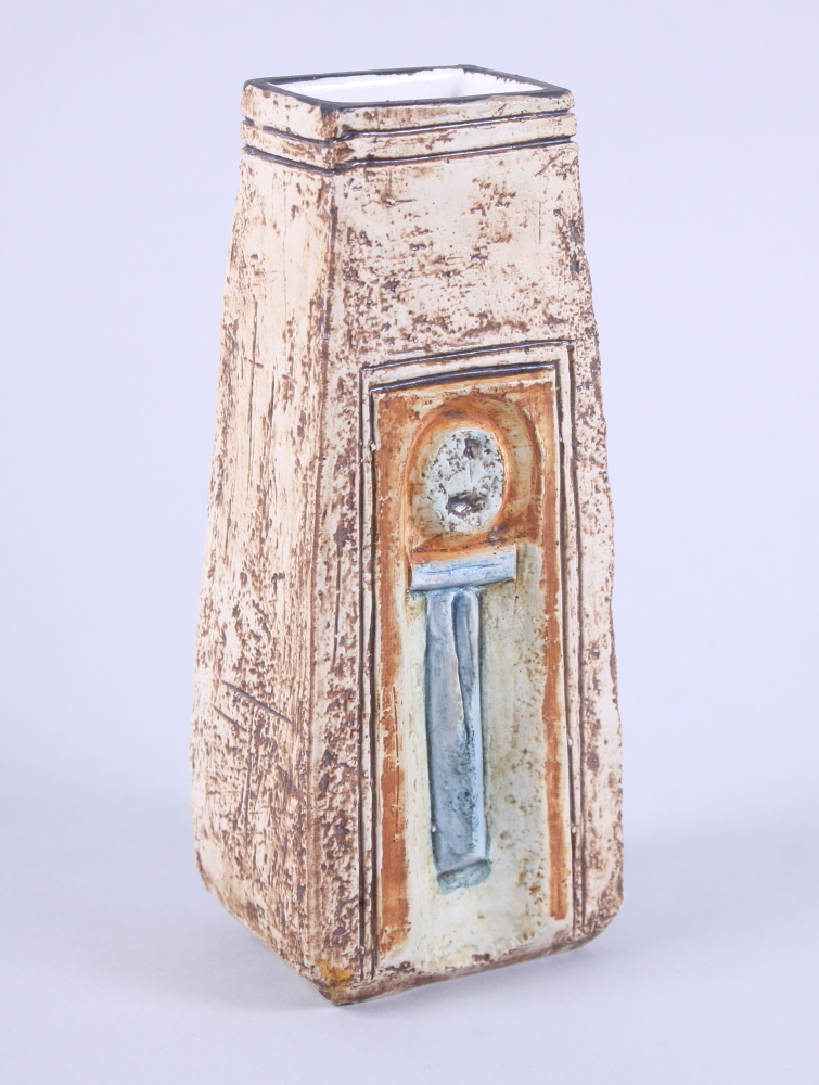 A Troika coffin vase with brown and blue glaze and incised decoration, 7" high