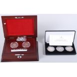 The George III & IV silver crowns, two silver crowns dated 1891 and 1821, in Royal Mint presentation