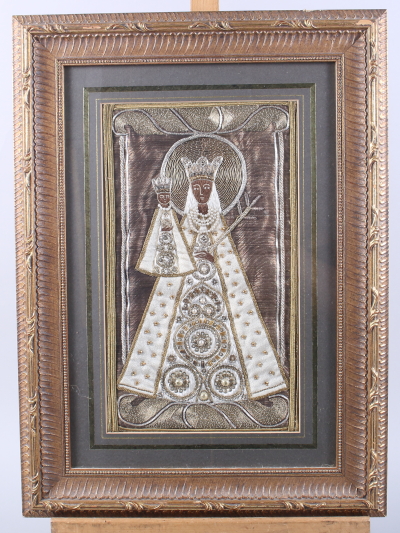 An embroidery, Madonna and child, in gilt frame