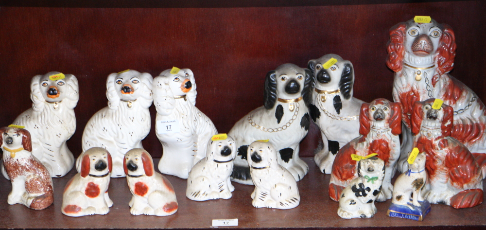 Seven pairs of Staffordshire dogs, various, five single dogs and a cat, in sizes