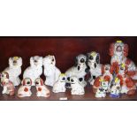 Seven pairs of Staffordshire dogs, various, five single dogs and a cat, in sizes