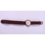 A Waltham USA gentleman's 9ct gold cased wristwatch with white enamel dial, Arabic numerals and