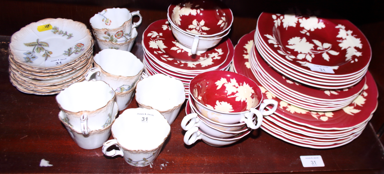 A Wedgwood combination service, decorated leaves on a maroon ground, and a Victorian floral