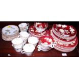A Wedgwood combination service, decorated leaves on a maroon ground, and a Victorian floral