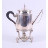 An early 19th century French silver teapot with ebony handle, stand and lamp, 22.9oz troy gross