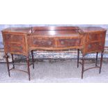 A George III mahogany bowfront sideboard, fitted four drawers, on eight turned and fluted supports