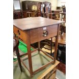 An oak occasional table with pierced frieze, on square stretchered supports, 22" square