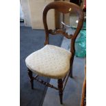 A set of six early 20th century beech carved bar back dining chairs, on bobbin turned supports