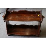 An early 20th century polished as walnut two-tier open wall shelf, 21" wide