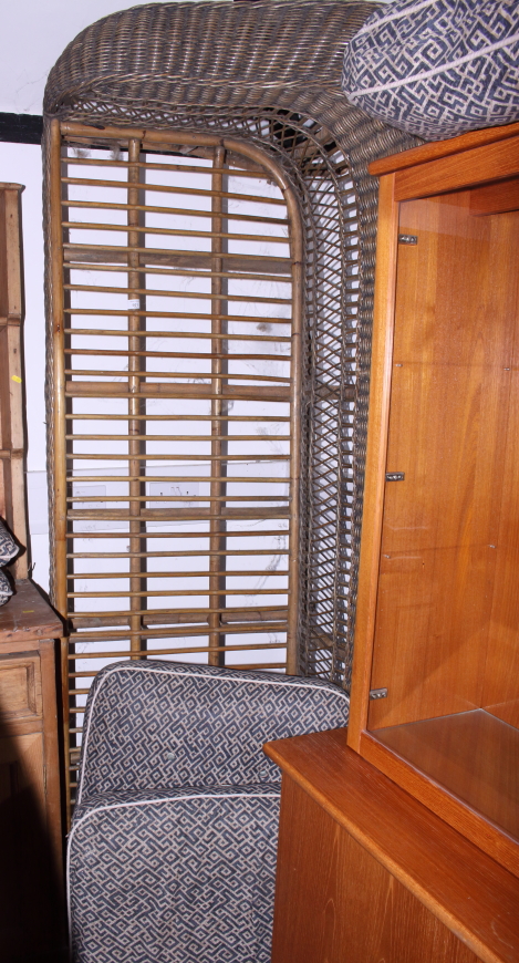 A Harrods two-piece rattan loggia suite with loose seat and back cushions