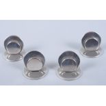 A set of four silver circular menu/place card holders, by Sampson Mordan & Co