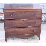 A 19th century mahogany chest of three long drawers, on bracket feet, 35" wide x 34" high
