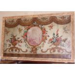 An 18th century oil on canvas panel, decorated central classical scene flanked by vases of