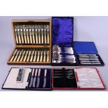 A canteen of silver plated fish knives and forks, a boxed set of soup spoons and other cutlery