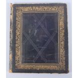 An early 19th century scrapbook with various hand-painted sketches, in a leather and gilt bound
