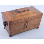 A 19th century rosewood tea caddy with wooden ring handles, on bun feet, 12 1/2" wide (damages)
