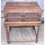 A late 17th century carved oak lace box with two friezes of lunettes and strap work, on later