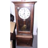 An oak cased "Simplex" clocking-in clock with white enamel dial and Roman numerals