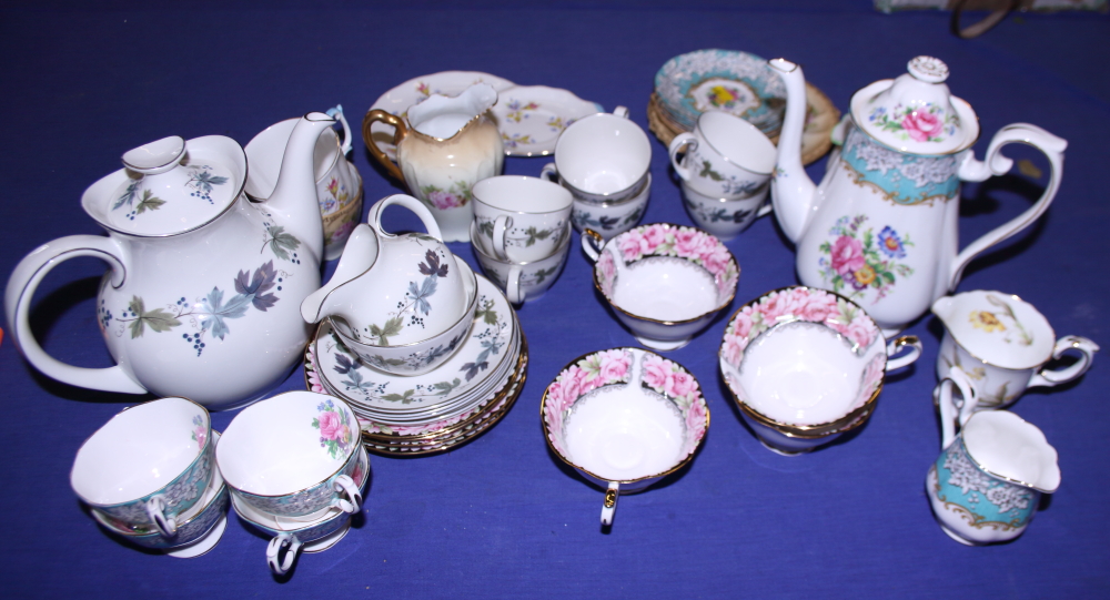 A Royal Doulton "Burgundy" pattern coffee set, two other coffee sets, and other decorative china