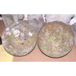 A pair of cast stone balls, 15" dia