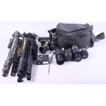 A Nikon 25mm SLR FE camera, a Hoya HMC zoom and macro 80-205mm lens, a Nikon Nikkor 200mm 1:4