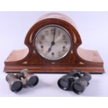 An early 20th century mantel clock, in mother-of-pearl inlaid mahogany "Napoleon's Hat" case, and