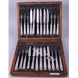 A matched set of silver handled dessert knives and forks, in fitted oak canteen