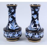 A pair of Continental glass vases, decorated blue flowers, 10" high