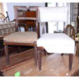 A pair of Regency rosewood side chairs with stuffed over backs and seats, on spiral turned supports,
