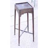 A George III mahogany square kettle stand, fitted slide to frieze, on square tapered supports