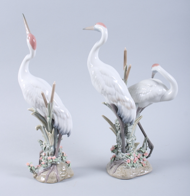 A pair of Lladro models of storks, on floral encrusted bases, 12" high - Image 2 of 3
