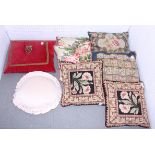 Four floral gros point covered cushions and four other cushions