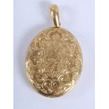 A 19th century 18ct gold locket with scrolled and floral engraved decoration, 17.9g weighable