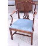 A mahogany carver dining chair of Hepplewhite design with pierced splat back and drop in seat