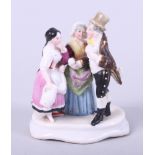 A 19th century Russian porcelain miniature figure group, "Matchmaker", gentleman and two women, 2