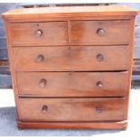 A late 19th century mahogany chest of two short and three long drawers, on bun feet, 46" wide x