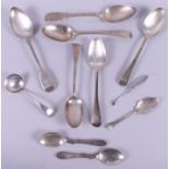 A quantity of silver cutlery, including a butter knife, a slotted spoon, etc, 15.8oz troy approx