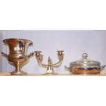 A pair of 1950s silver plated candlesticks, a plated circular serving dish and cover with liner, a
