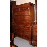 A Georgian mahogany tallboy, the upper section fitted two small and three long drawers, over three