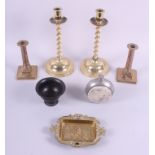 A pair of 18th century brass candlesticks, a pair of barley twist candlesticks, a brass dish, a