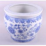 A blue and white jardiniere, decorated in foliage and flora, 14" dia