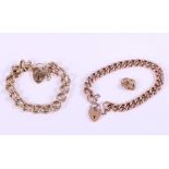 Two 9ct gold curb link bracelets with heart-shaped clasps and two spare links, 99g gross