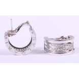 A pair of B.Zero 1 design white metal half hoop earrings, stamped Bulgari 750, set two rows of pave