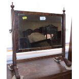 An early 19th century swing frame toilet mirror, on reeded stand, plate 8 1/2" x 13"