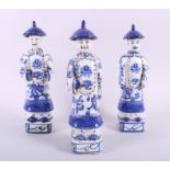 A set of three Chinese blue and white porcelain figures, Mandarins, 12" high