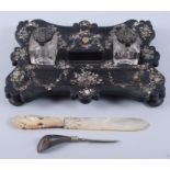 A Victorian black papier-mache inkstand with mother-of-pearl decoration, a carved mother-of-pearl