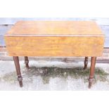 An early 20th century mahogany drop leaf table, fitted one drawer, on turned supports, 42" wide x 20